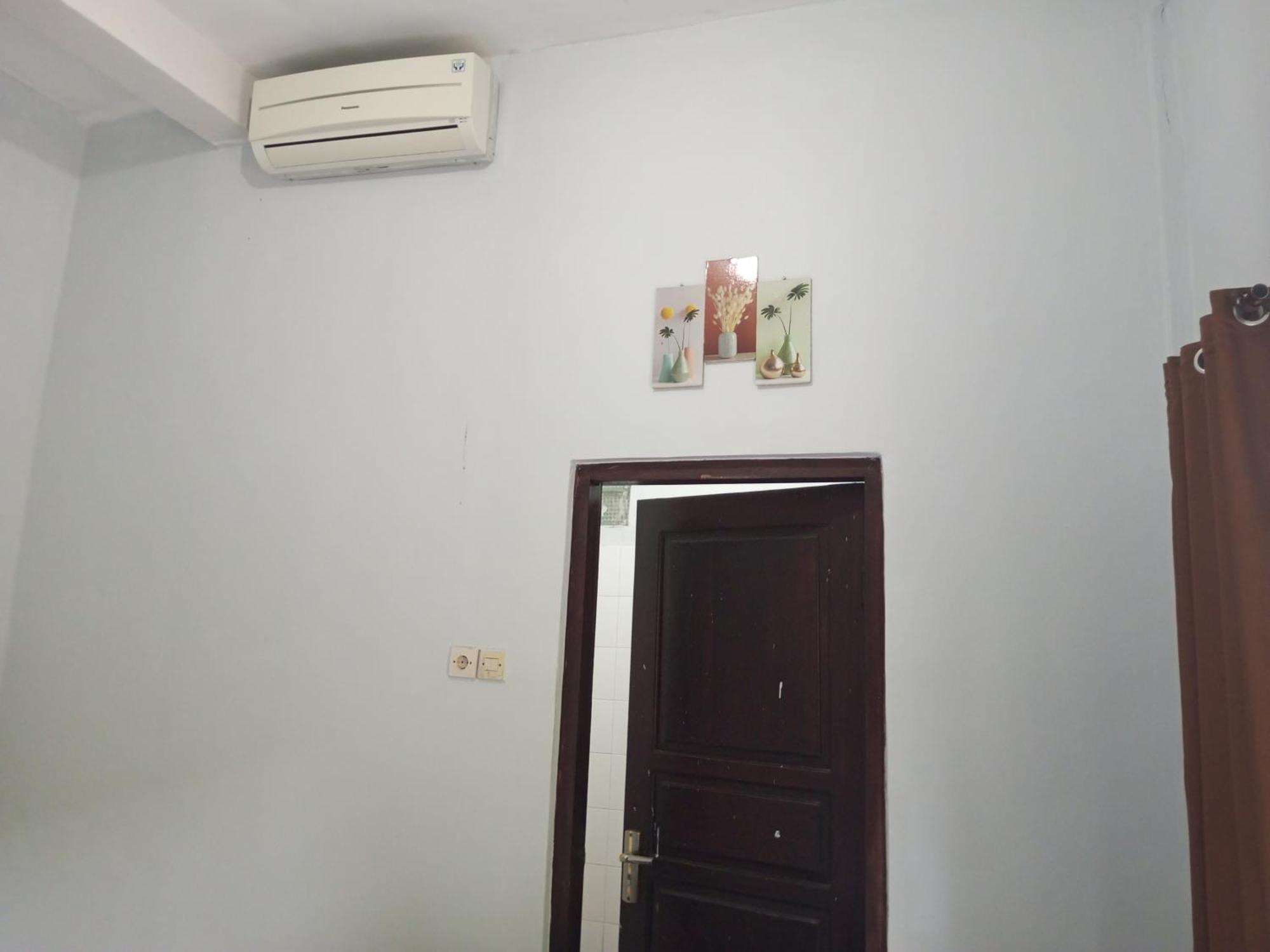 Kri Homestay Kuta  Szoba fotó