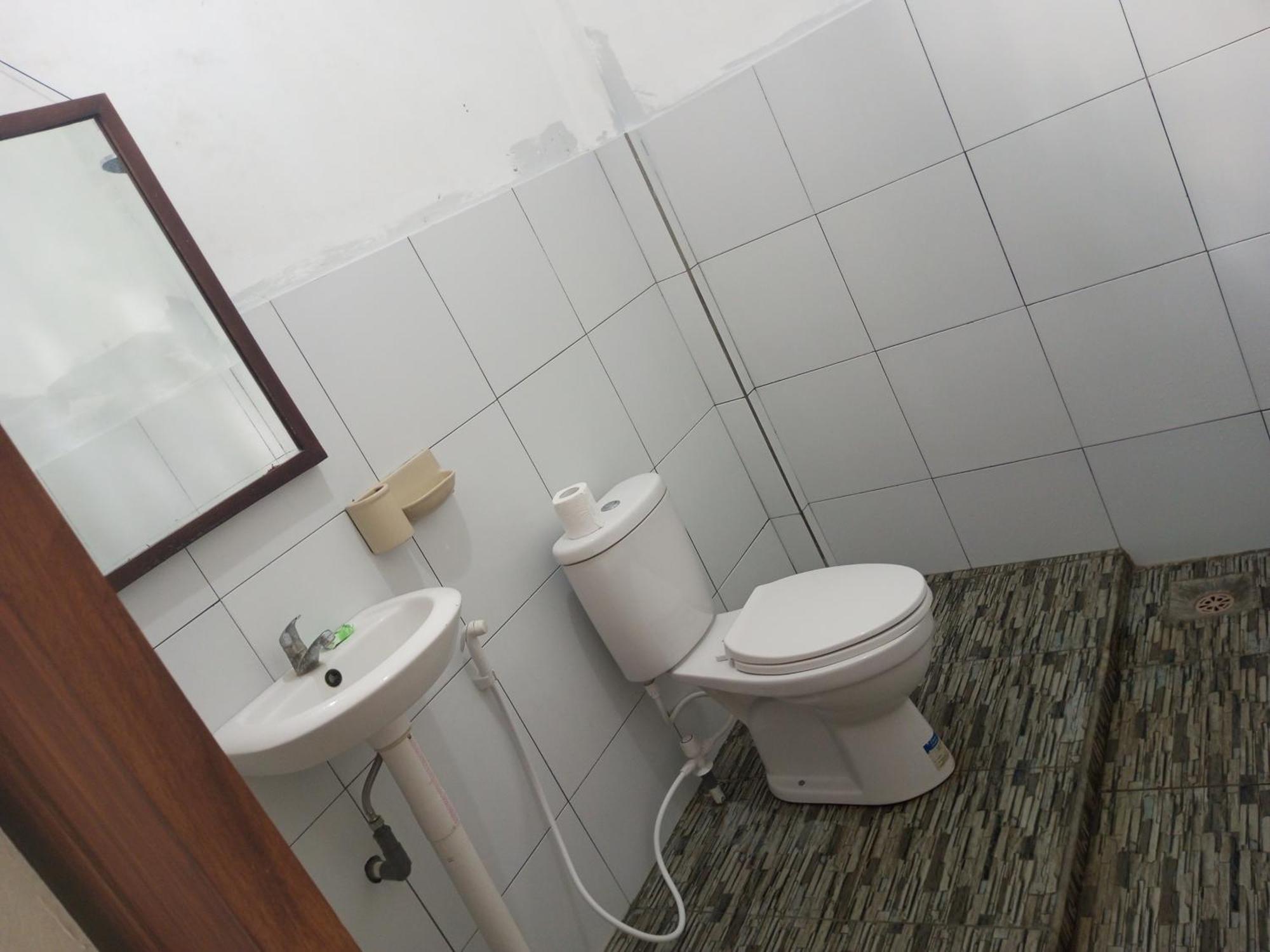 Kri Homestay Kuta  Szoba fotó